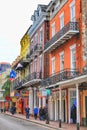 Historic buildings on Bourbon Street in French Quarter at early night